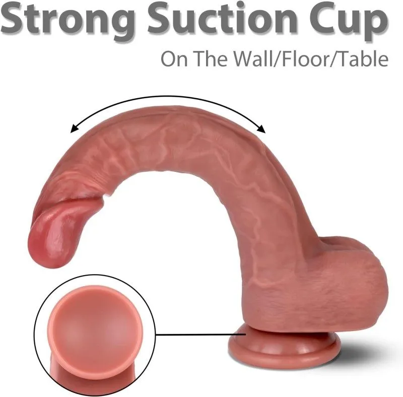 KY09 dildo attached to a surface by its suction cup, showing how the shaft bends