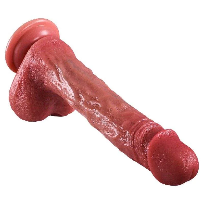 KY10 dildo lying diagonally beside its remote controller