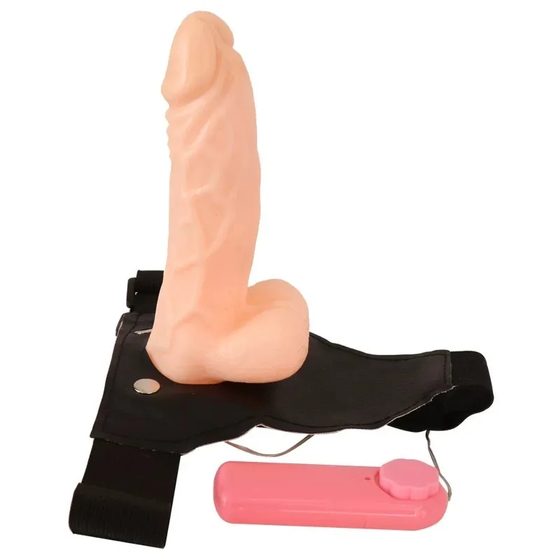 KY11 harness, dildo and pink remote controller laid out as a complete set