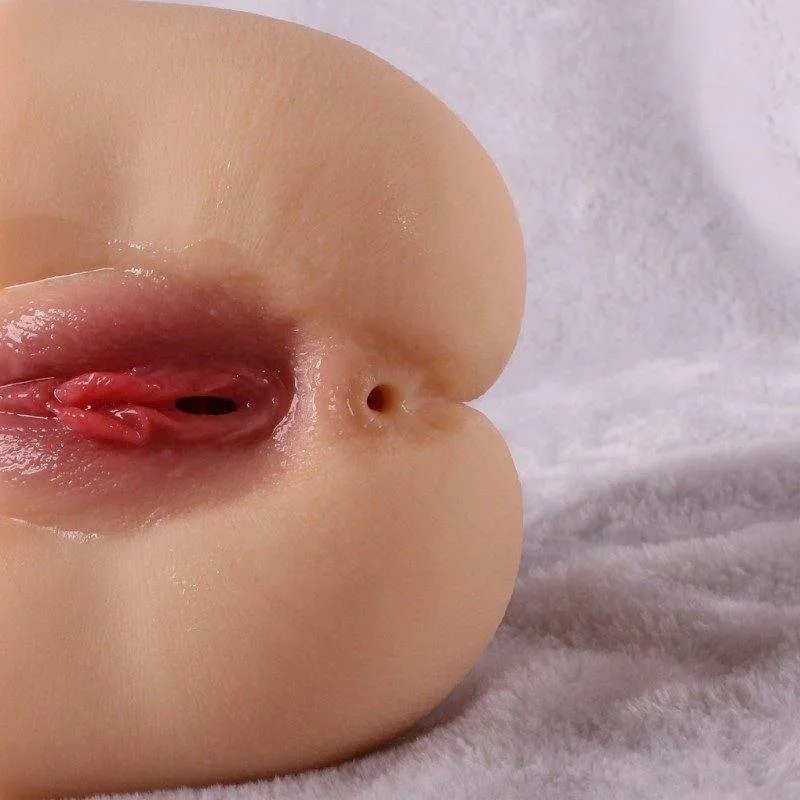 Close-up of the vaginal-style and anal-style openings on the KY14 masturbator