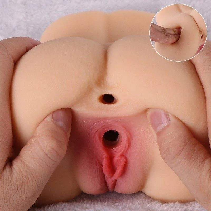 KY14 dual-entry masturbator held open to show both internal channels