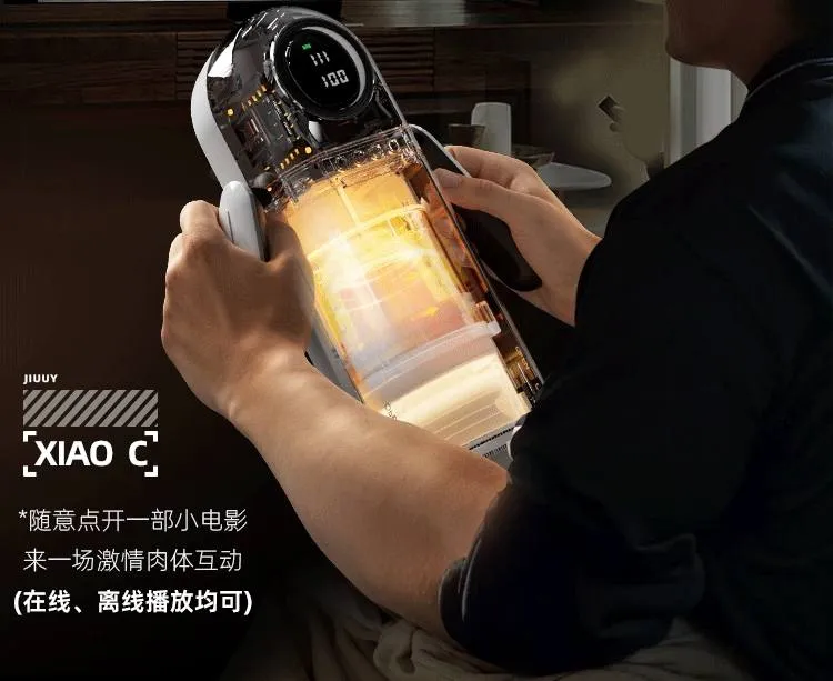 KY23 electronic masturbator held with both hands while its illuminated sleeve and LCD screen are visible