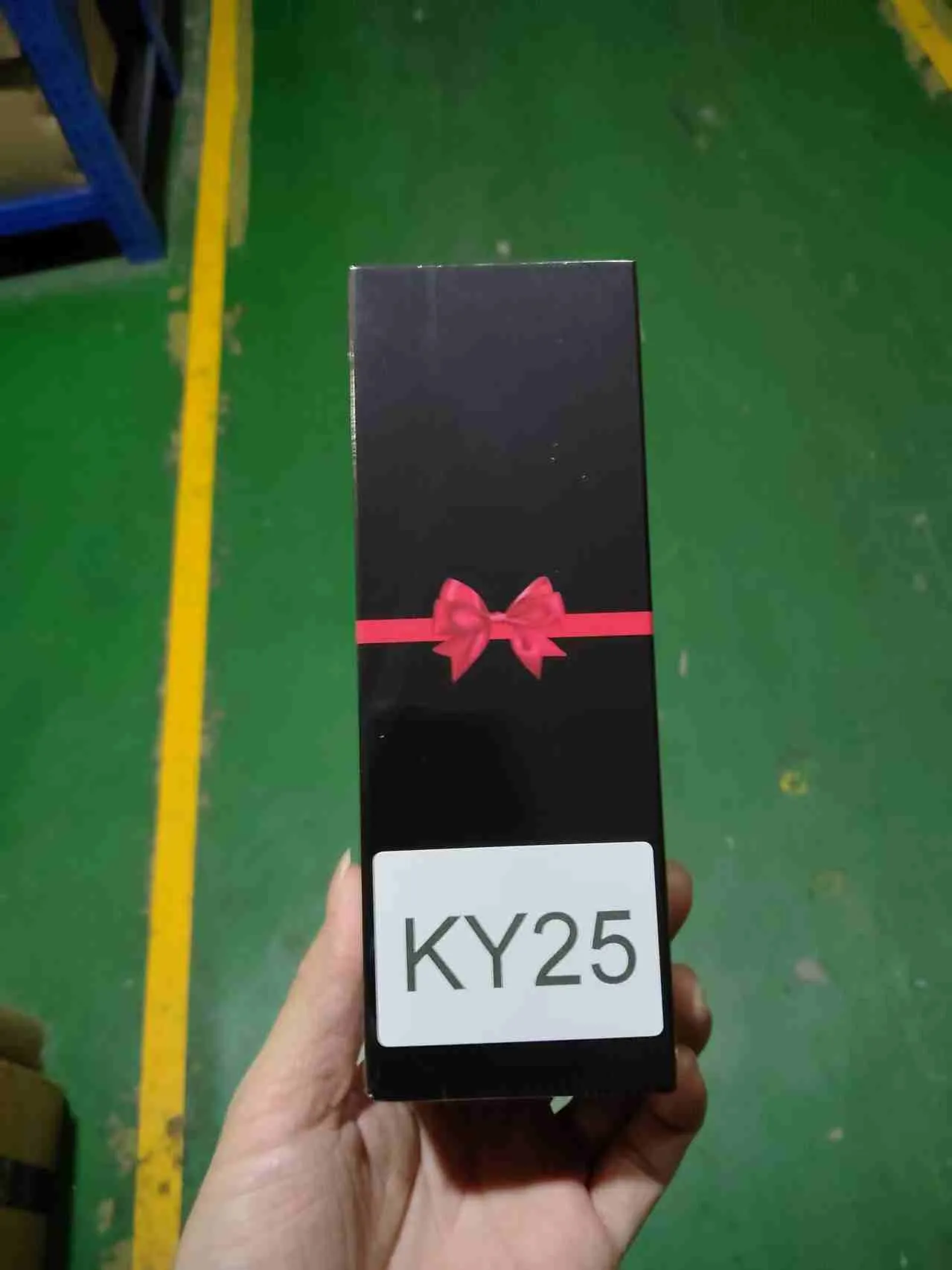 KY25 penis sleeve presented in its black gift box with a red ribbon