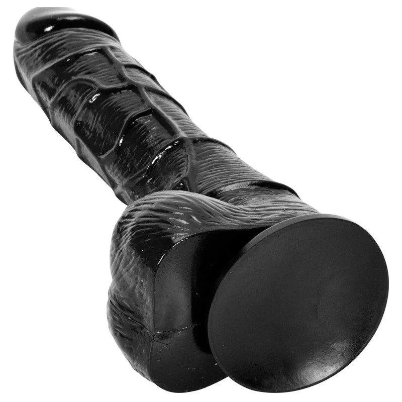 Close-up of the KY32 black dildo and its wide suction cup base
